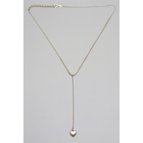 7070 - An Italian silver necklace with a heart drop pendant and ball chain, 45.5cm full extension