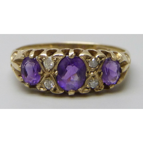 7087 - A 9ct gold, amethyst and diamond ring, 2g, M