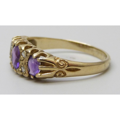 7087 - A 9ct gold, amethyst and diamond ring, 2g, M