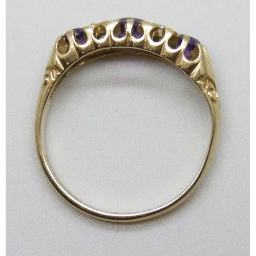 7087 - A 9ct gold, amethyst and diamond ring, 2g, M