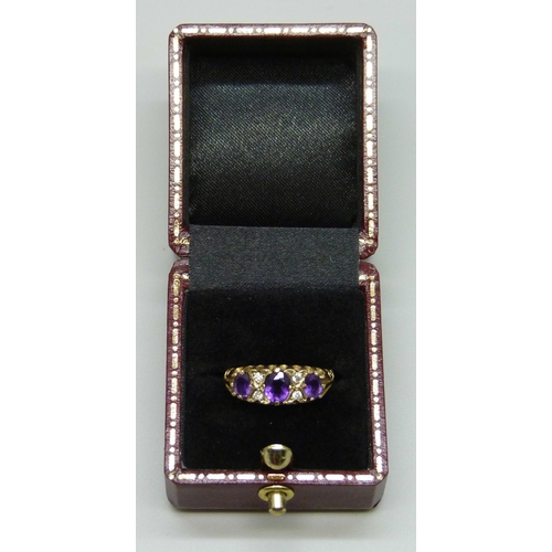 7087 - A 9ct gold, amethyst and diamond ring, 2g, M
