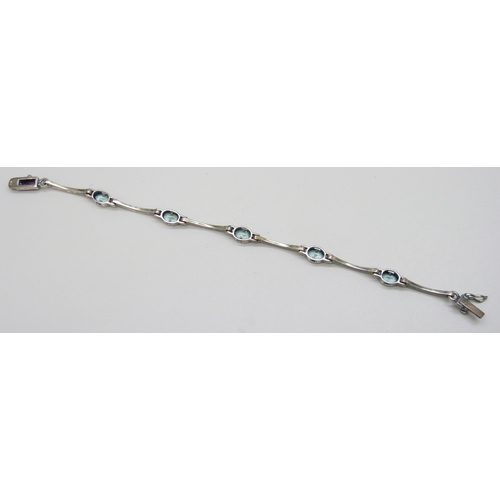 7089 - A silver and blue paste stone bracelet, 17.5cm