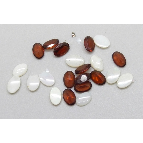 7090 - A collection of loose opals and garnets, some a/f, 1.5g