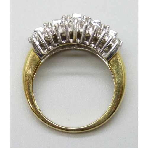 7092 - An 18ct gold diamond cluster ring set with 1ct of diamonds, marked 1.00 to shank, 5.6g, K