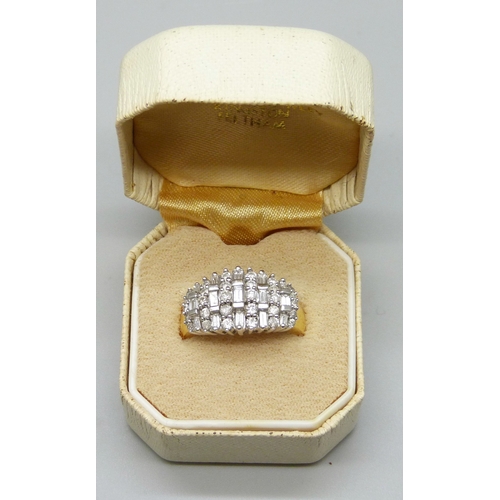 7092 - An 18ct gold diamond cluster ring set with 1ct of diamonds, marked 1.00 to shank, 5.6g, K