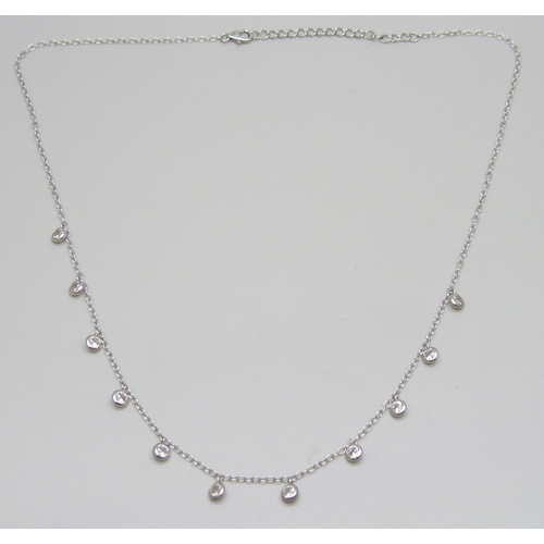 7097 - A silver fringe style necklace set with cubic zirconia stones, 49.5cm full extension