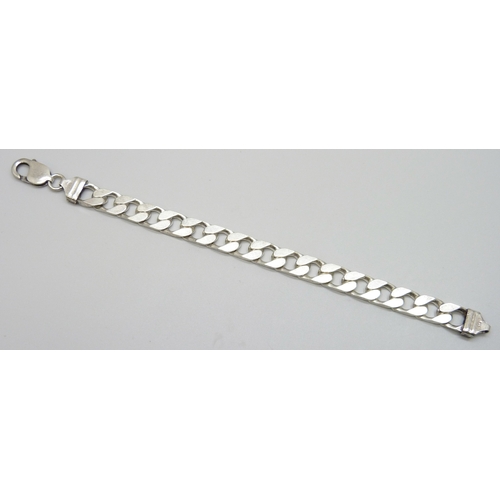 7099 - A silver chunky curb chain bracelet, 30g, 19cm, 9mm wide