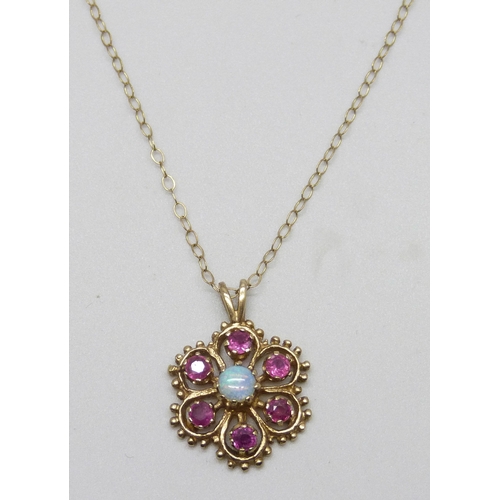7119 - A 9ct gold, ruby an opal cluster pendant, 2cm including bail, on a 9ct gold chain, 2.2g total
