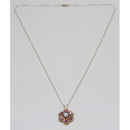 7119 - A 9ct gold, ruby an opal cluster pendant, 2cm including bail, on a 9ct gold chain, 2.2g total