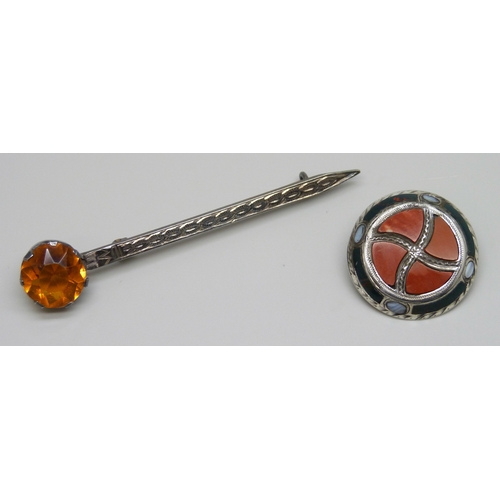 7129 - A Scottish silver kilt pin brooch, 8.2cm, and a Victorian white metal brooch set with hardstones
