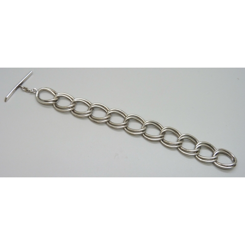 7132 - A silver chunky link bracelet, 50g, 21cm, 1.8cm wide links