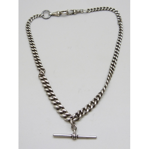 7149 - A silver graduated double Albert chain with two silver dog clips (unmatched), and a silver T bar, on... 