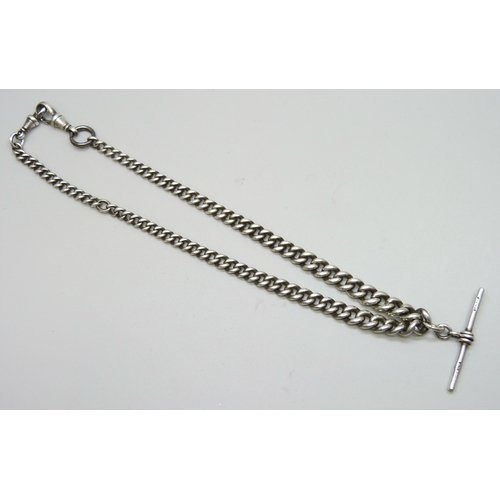 7149 - A silver graduated double Albert chain with two silver dog clips (unmatched), and a silver T bar, on... 