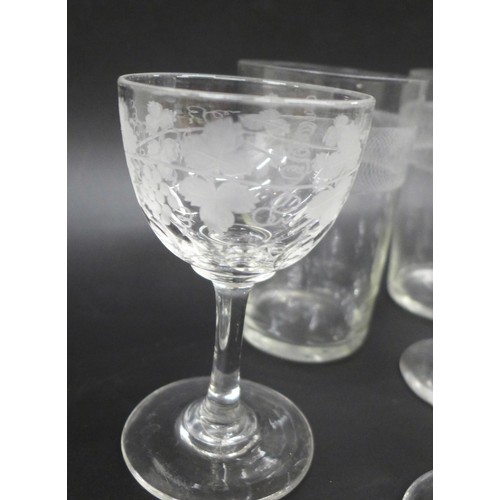 2030 - A collection of liqueur glasses, two Victorian examples and two beakers, some with etched detail, fo... 