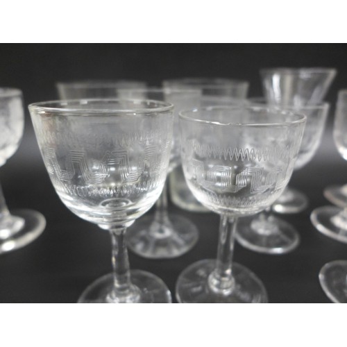 2030 - A collection of liqueur glasses, two Victorian examples and two beakers, some with etched detail, fo... 