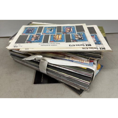 2113 - Stamps; a collection of approximately fifty Royal Mail presentation packs to include Art and Craft, ... 