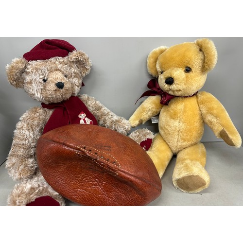 2117 - A Harrods 1999 Christmas bear, a Merrythought Teddy bear and a leather rugby ball ( lacking lace )