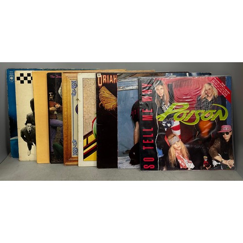 2129 - Nine vinyl LPs including, Twisted Sister, Uriah Heep, Black Sabbath and a 12