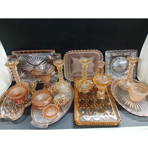2149 - Large collection of Art Deco pink / peach glass comprising of dressing table sets, trays, candlestic... 