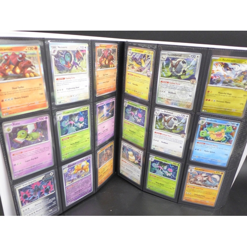 A large Pokmon binder containing over 390 Holographic Pokmon cards  including Black Star Rares and