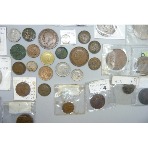 A collection of world coins including bronze Ceylon, East Africa ...