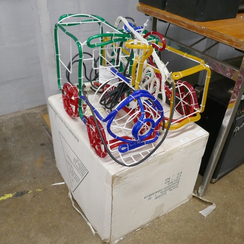 An LED rope light 3D train ornament