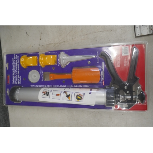 A metal Stanley toolbox containing plasterers tools, 3 x spirit levels ...
