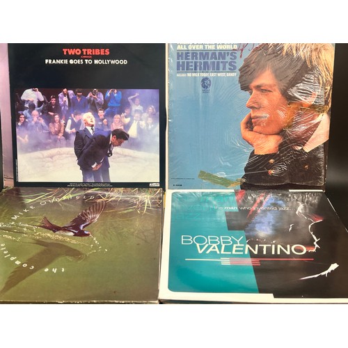 2114 - A collection of LP records including John Lennon, Mike Oldfield, The Beatles, The Monkees, etc.