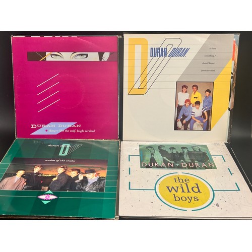 2114 - A collection of LP records including John Lennon, Mike Oldfield, The Beatles, The Monkees, etc.