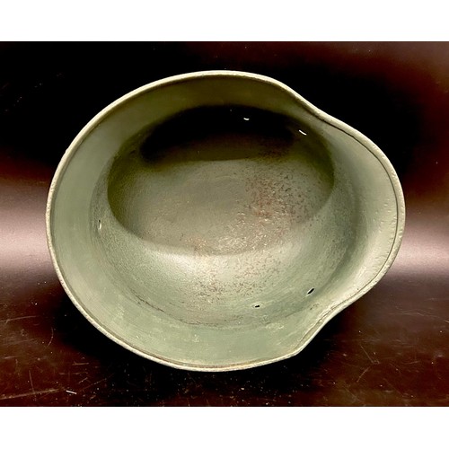 2134 - A German World War II helmet shell,