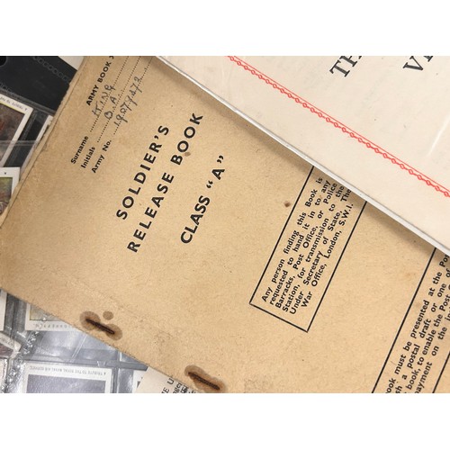 2150 - A collection of World War I and World War II ephemera, letters, service records, cigarette cards, et... 
