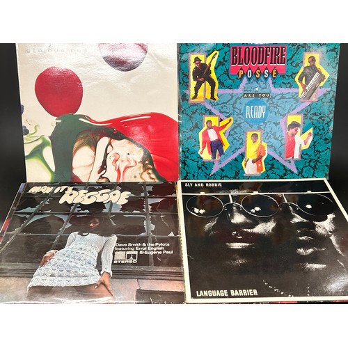 2151 - Nine vinyl LP records; reggae and dub, including Dennis Bovell, Black Uhurn, Sly and Robbie