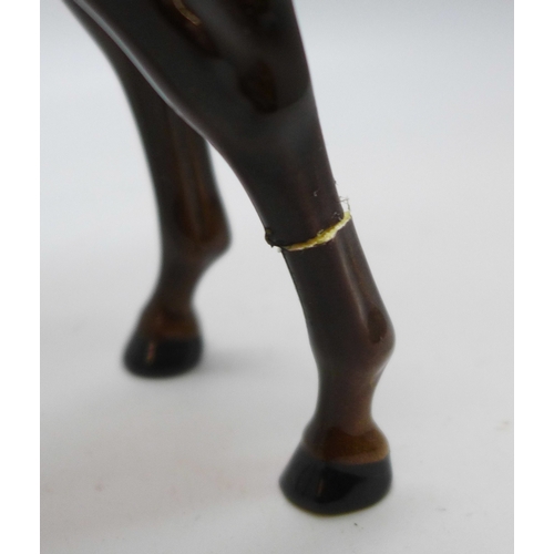 2034 - A collection of four model horses, 2x Beswick and 2x Royal Doulton horses, two a/f