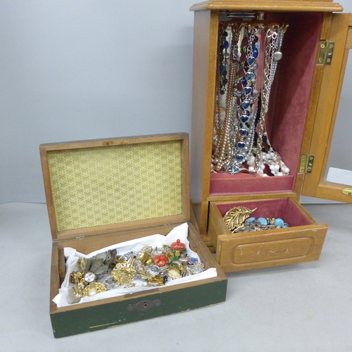 2062 - A jewellery box with rings, bracelets, etc., and a box of clip-on earrings