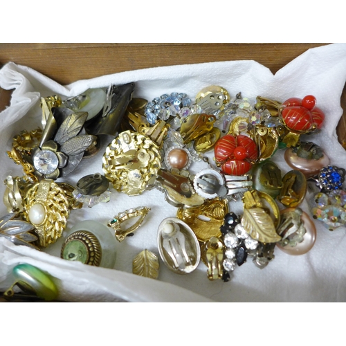 2062 - A jewellery box with rings, bracelets, etc., and a box of clip-on earrings