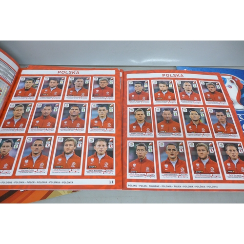 2063 - A collection of Panini football sticker albums - all complete comprising two 2010 FIFA World Cup Sou... 