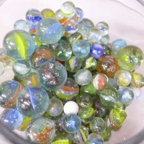2068 - A glass jar of marbles, 1970s