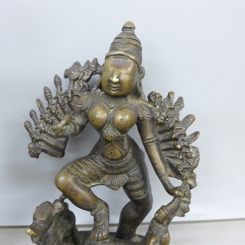 2081 - Three bronze Eastern figures including Hindu Goddess Durga, tallest 30cm