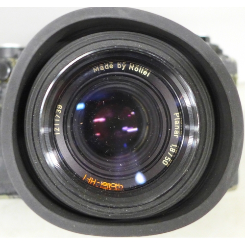 2093 - Two Rolleiflex SL35E camera bodies, one with attached Rollei Planar 1.8/50 lens