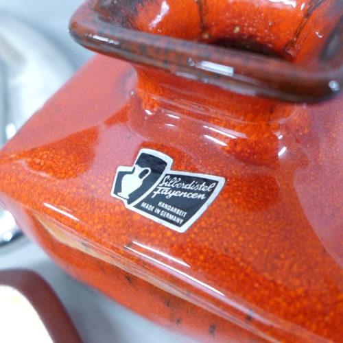 2094 - A German Silberdistel ceramic vase, a continental plaque, two mid 20th Century wall plates and a Rob... 