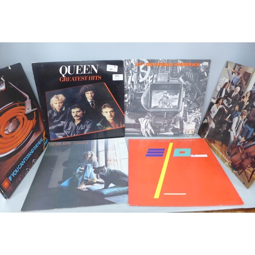 2095 - A collection of eighteen vinyl LPs, Queen, Elton John, ABBA, etc.