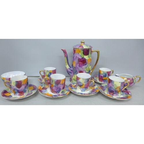 2099 - A Czechoslovakian porcelain six setting coffee service, fifteen pieces in total, one cup chipped