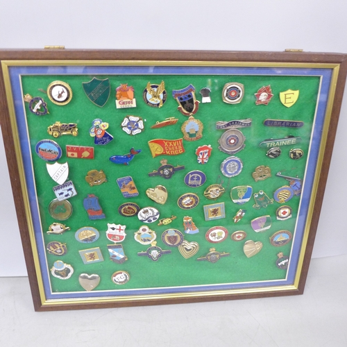 2100 - A collection of enamel badges, etc., including Butlin’s, mounted