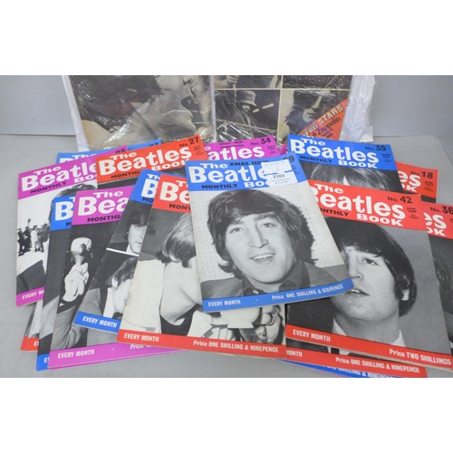 2102 - Twenty-five 1960s editions of The Beatles Monthly Book and two record song books with Paul McCartney