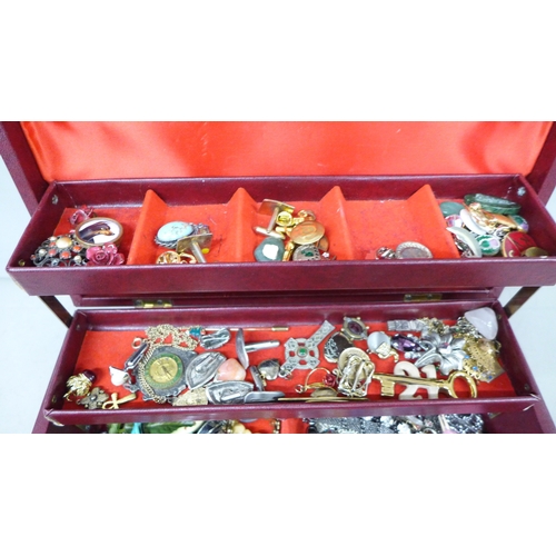 2104 - A jewellery box with necklaces, earrings, pendants, etc.
