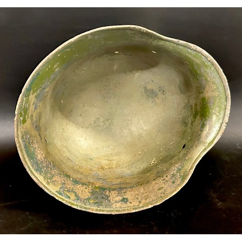 2163 - A German World War II helmet shell,