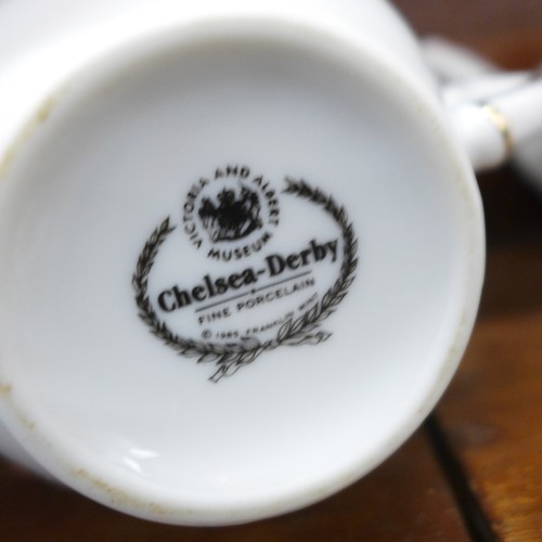 2106 - Nine Franklin Mint Victoria and Albert Museum replica teapots