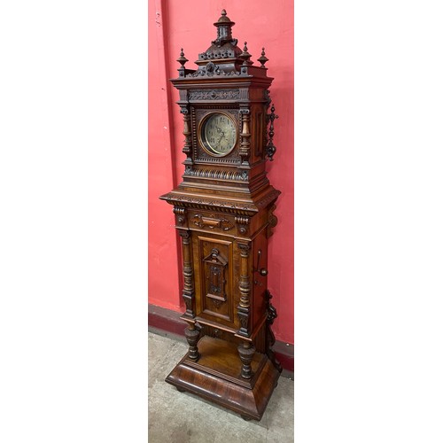 62 - A 19th Century Black Forest carved walnut symphonium 8-day longcase clock