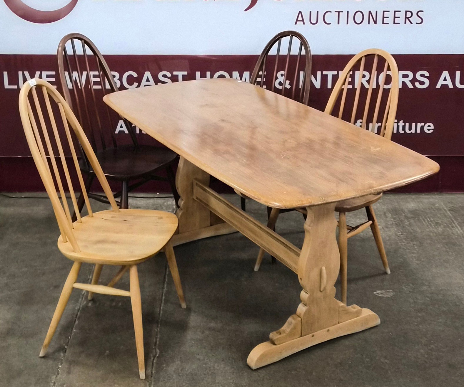 An Ercol ash rectangular dining table, a pair of Blonde elm and beech ...