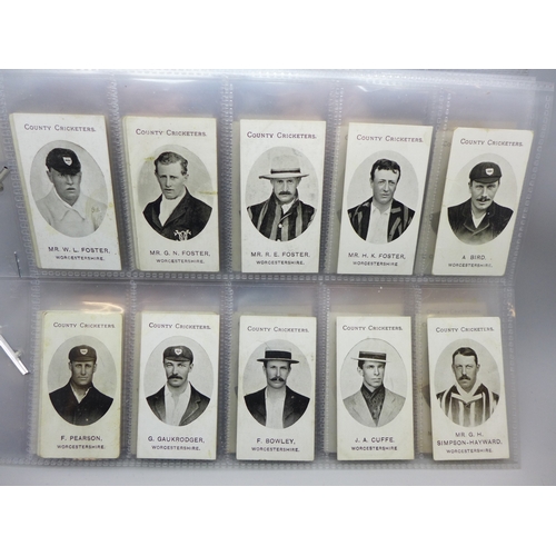 2034 - A collection of Taddy & Co., Imperial Tobacco and Grapnel Mixture trade cards, County cricketers, in...